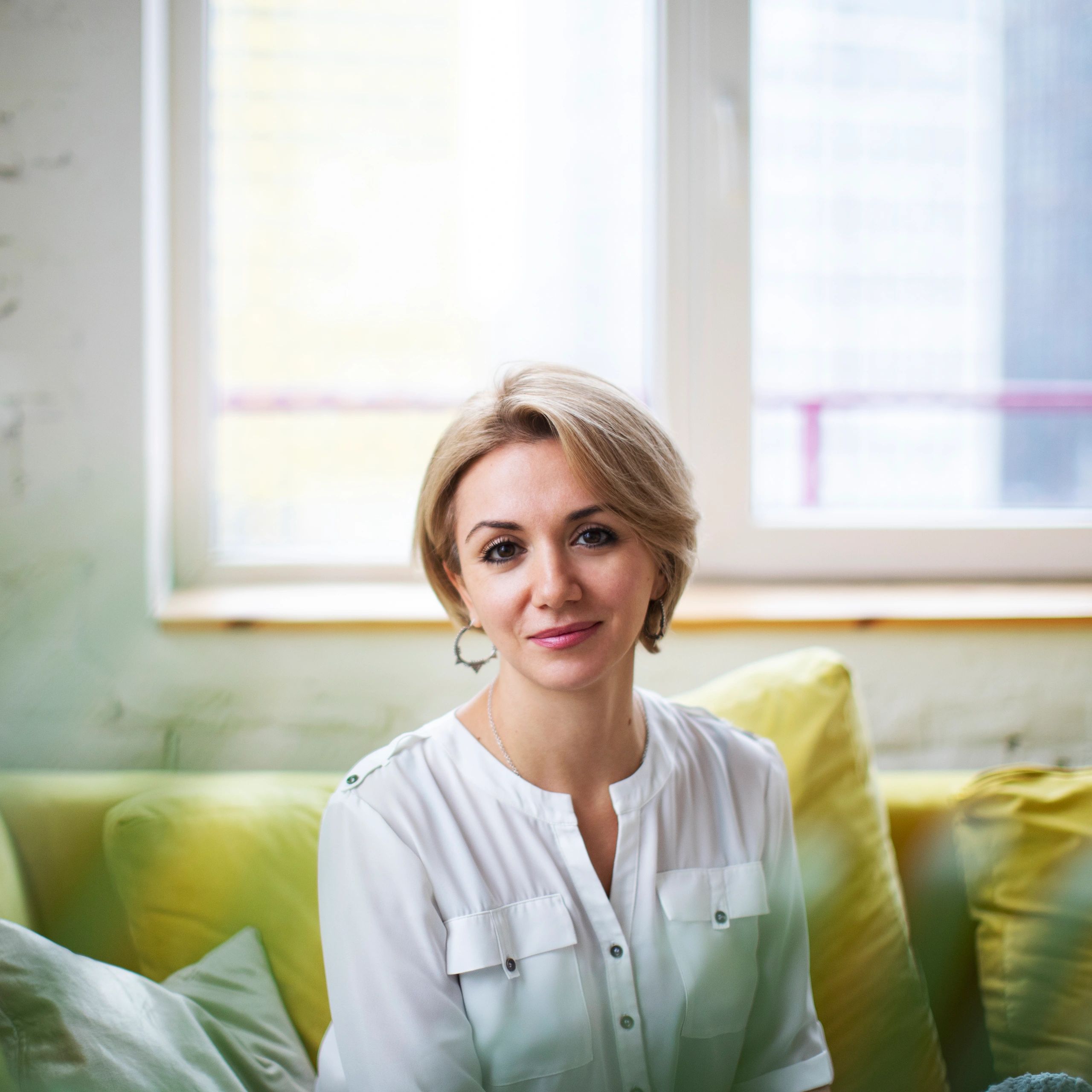 Portrait of happy renovation design client