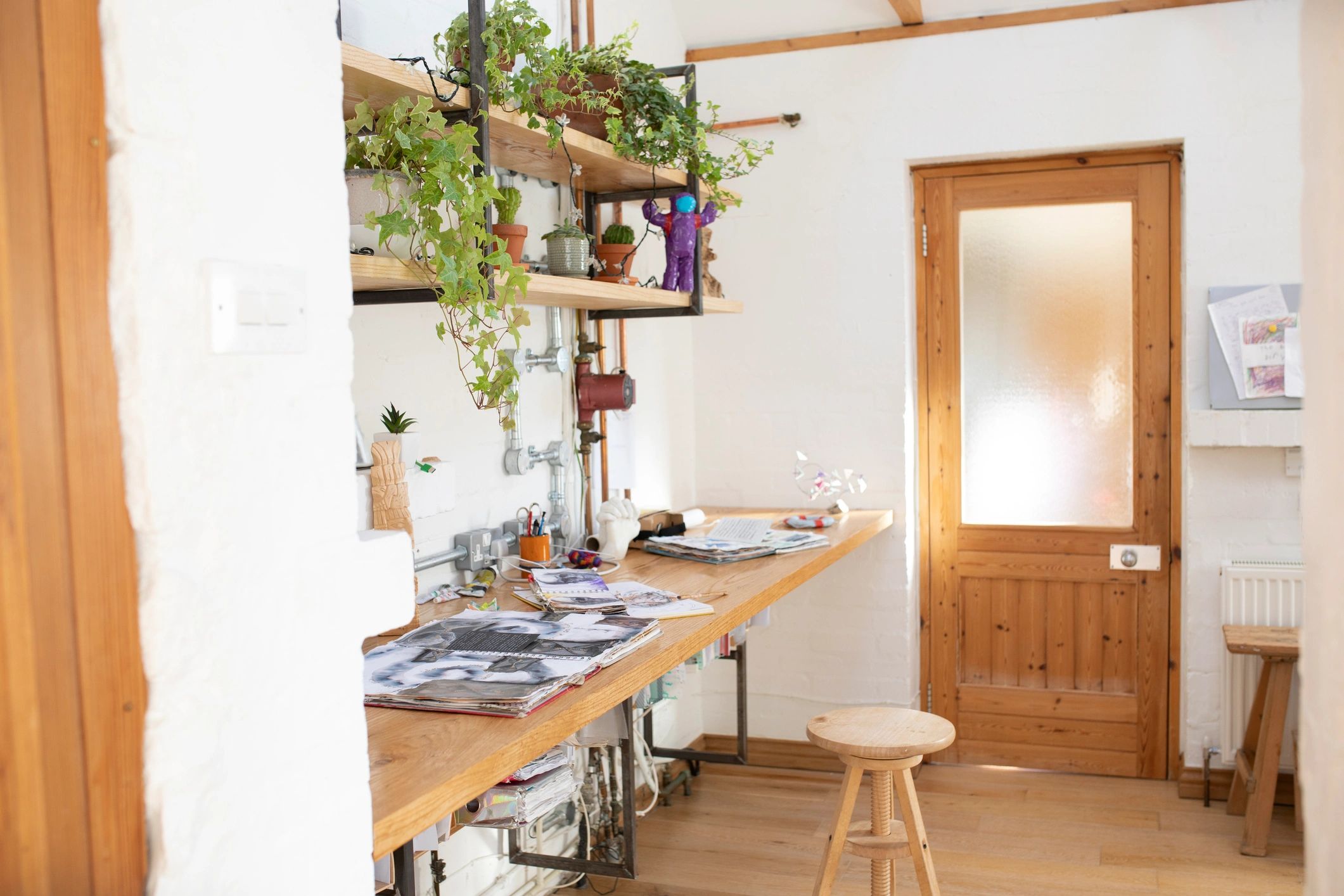 Interior design studio workspace with creative materials