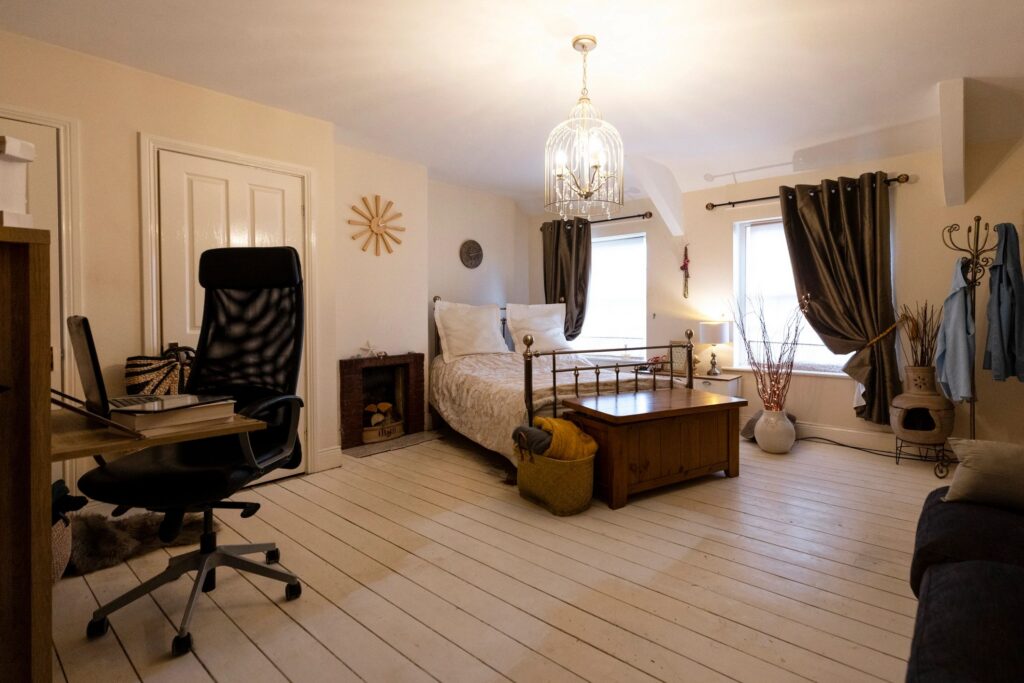 Refined bedroom interior with natural light and understated luxury