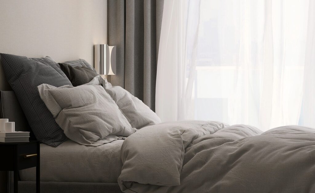Elegant bedroom retreat with charcoal accents and serene atmosphere