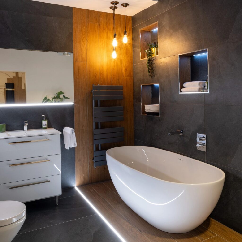 Bespoke luxury bathroom with moody stone finishes and spa calm