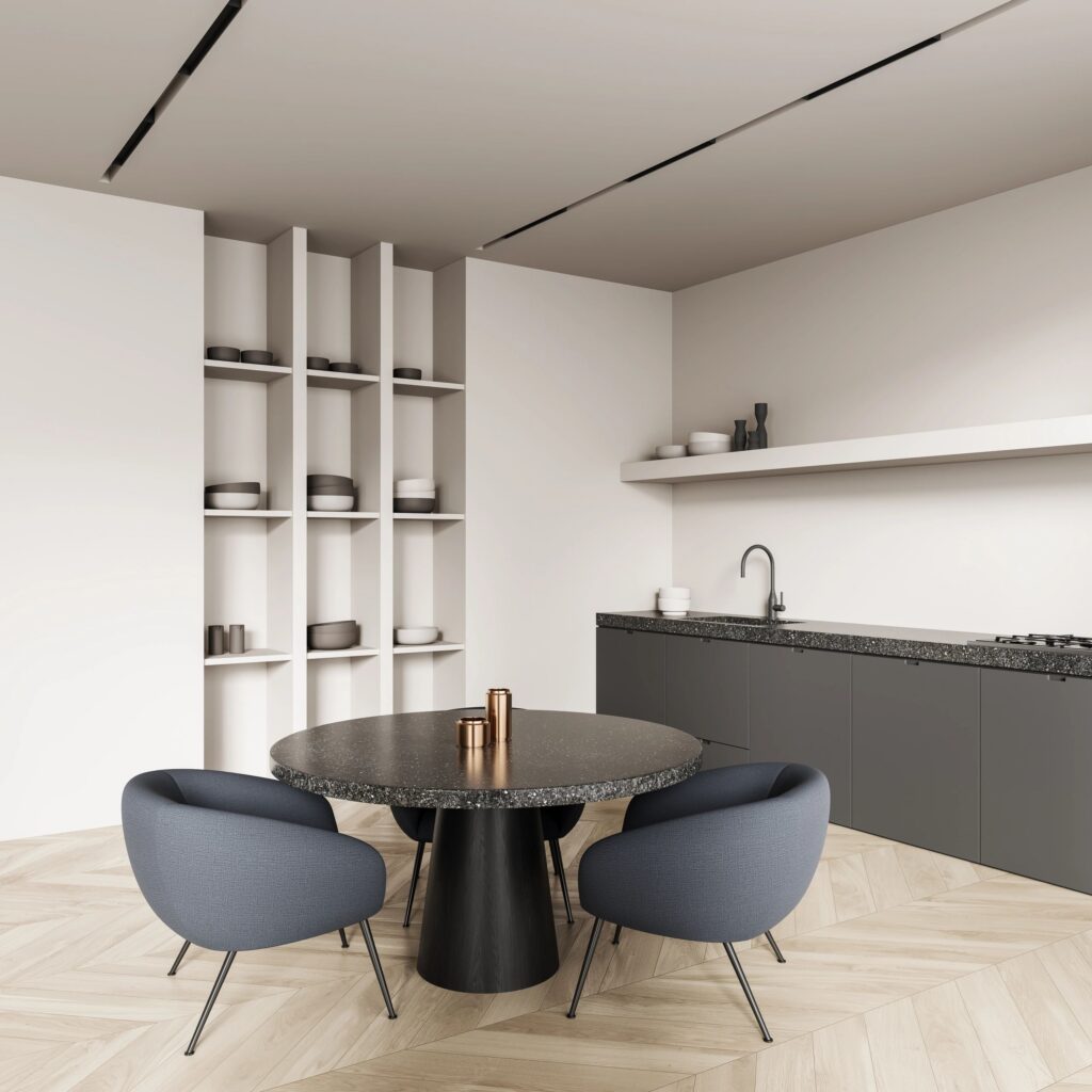 Minimalist kitchen and dining space with sculptural forms and warm wood